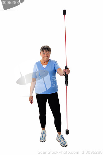 Image of Senior woman with swing stick
