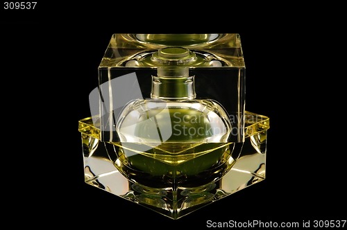 Image of Bottle of perfume over black background