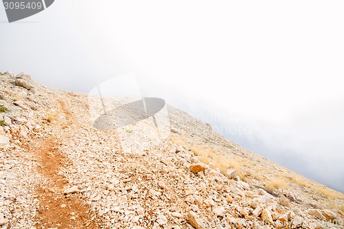 Image of mountains hid behind a veil of mist