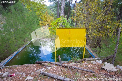 Image of green piping fresh water reservoir