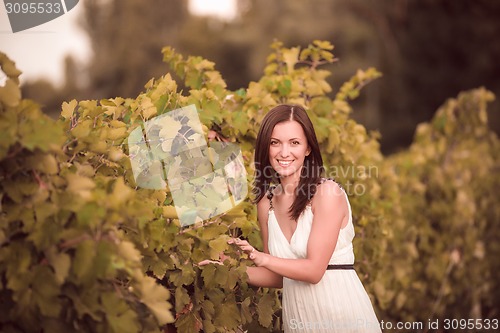 Image of Beautiful girl in the garden
