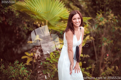 Image of Beautiful girl in the garden