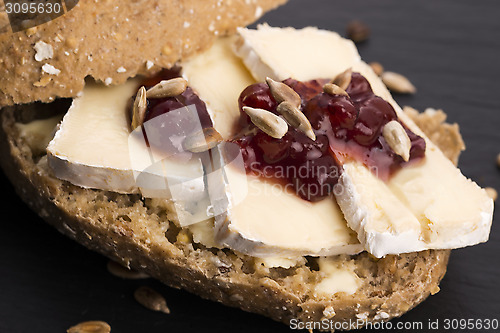 Image of bread served with camembert and cranberry