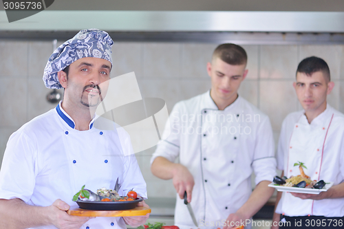 Image of chef preparing food