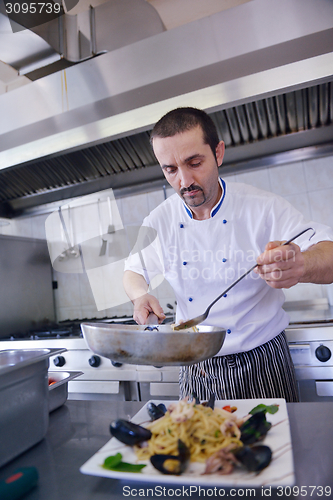 Image of chef preparing food