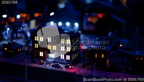 Image of night view of house in toy town