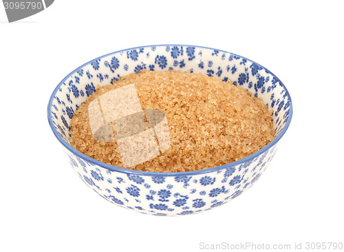 Image of Demerara sugar in a blue and white china bowl