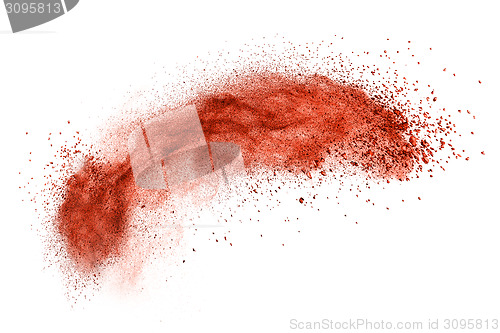 Image of red powder explosion isolated on white