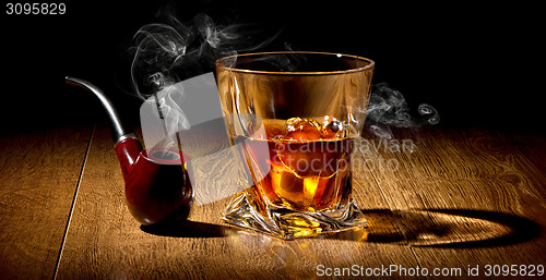 Image of Pipe and whiskey