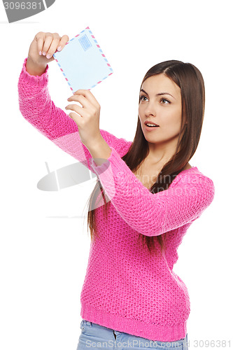 Image of Wooman looking at envelope