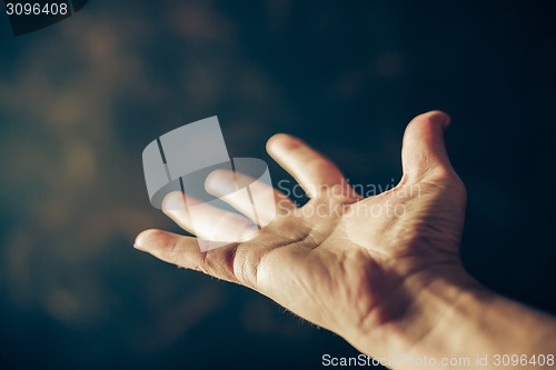 Image of hands begging 