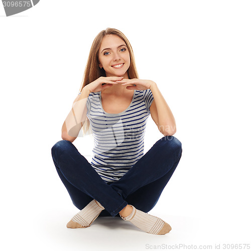 Image of Woman sitting on the floor