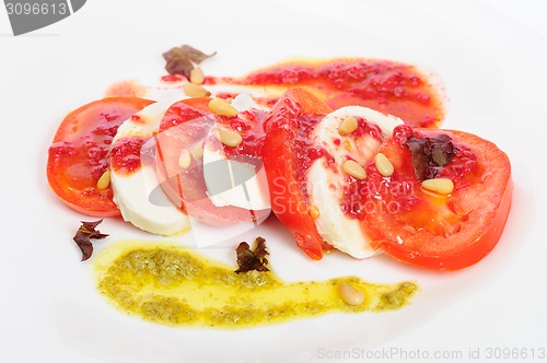 Image of Caprese antipasto salad with mozarella cheese, tomatoes 