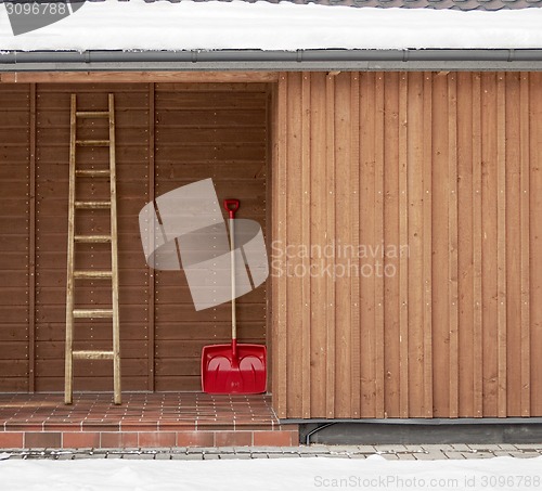 Image of Red shovel and ladder