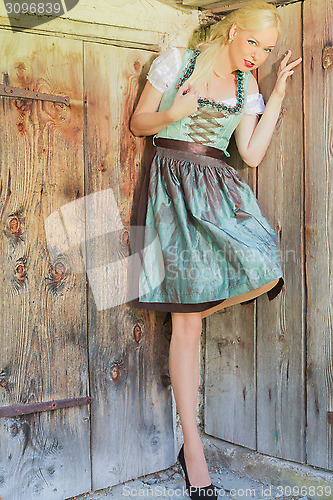 Image of Elegant blonde model in a dirndl