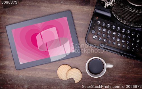 Image of Heart shape backgound on tablet