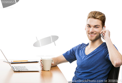 Image of Young man and talking at phone