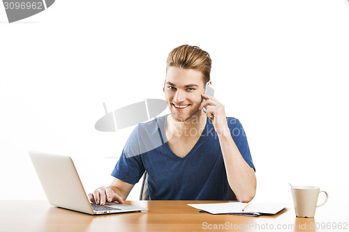 Image of Young man and talking at phone