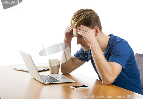 Image of Young man at the office