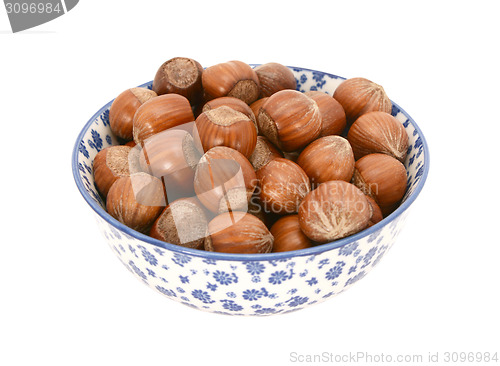 Image of Hazelnuts in a blue and white china bowl
