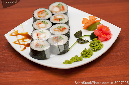 Image of sushi rolls with crabs meat