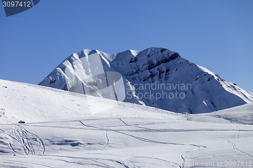 Image of Off-piste slope in sun morning