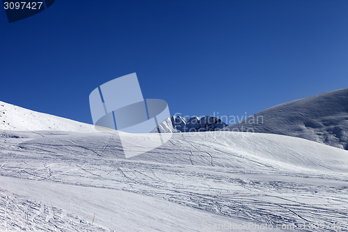Image of Ski slope in sun morning