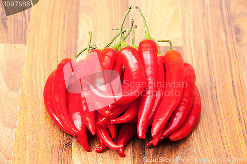 Image of Many stacked red chili successive