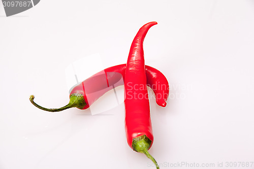 Image of spicy vegetables, red and cream