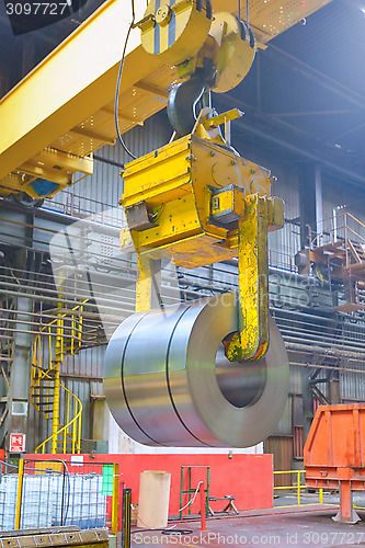 Image of crane loading of metal 