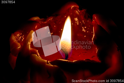 Image of closeup macro of light on candle 