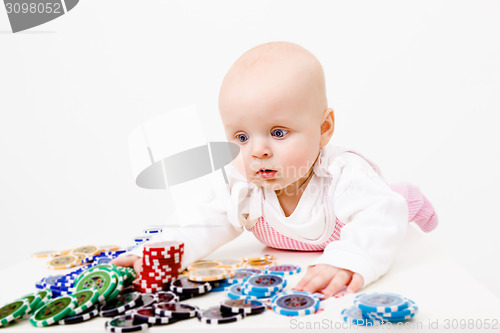 Image of infant with chips from the casino