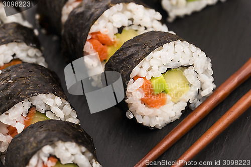 Image of Salmon rolls served on a plate