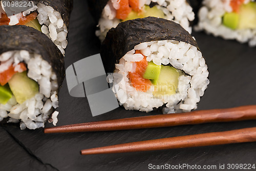 Image of Salmon rolls served on a plate