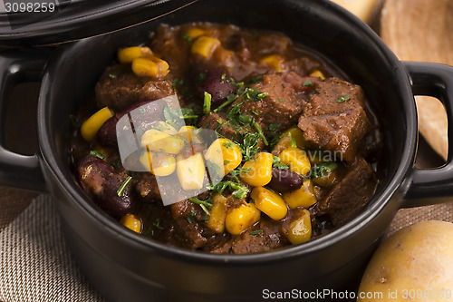 Image of Tasty winter traditional hot pot stew with meat and vegetables 