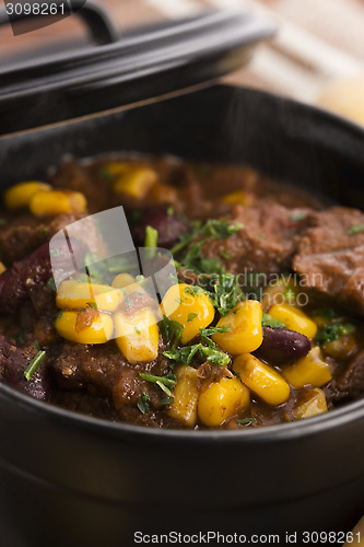 Image of Tasty winter traditional hot pot stew with meat and vegetables 