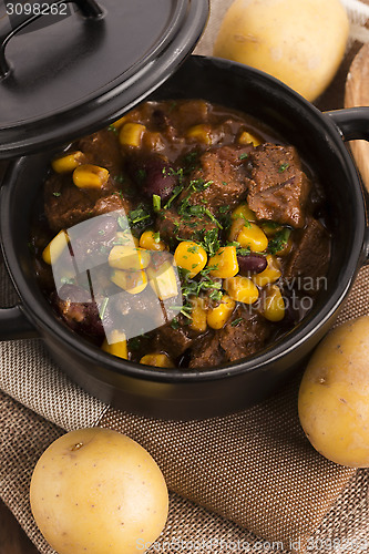 Image of Tasty winter traditional hot pot stew with meat and vegetables 