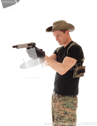 Image of Soldier pointing a pistol.