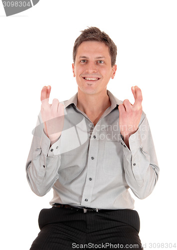 Image of Man crossing fingers