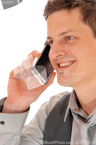 Image of Closeup man on cell phone.