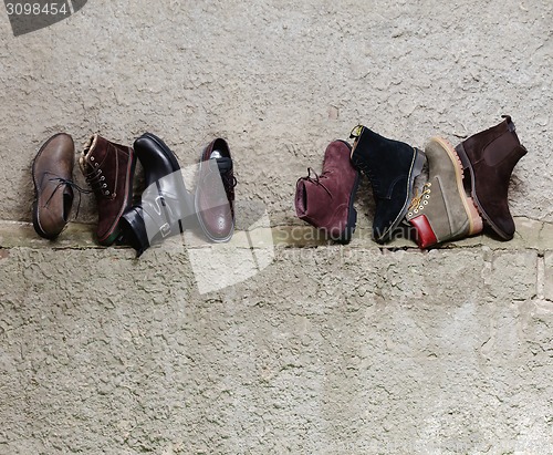 Image of Set of man footwear on a grunge  background