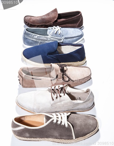 Image of Set of man footwear on a white background