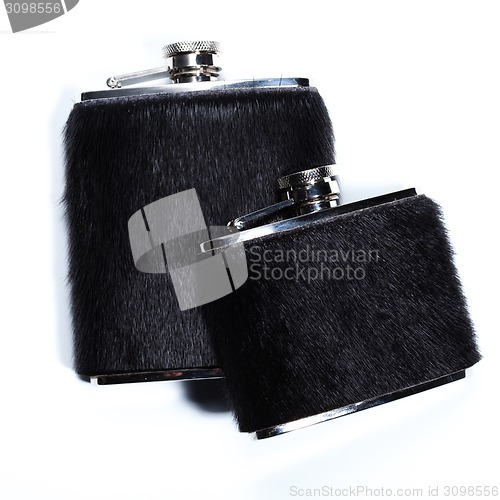 Image of Metal flasks for alcoholic beverages on white.