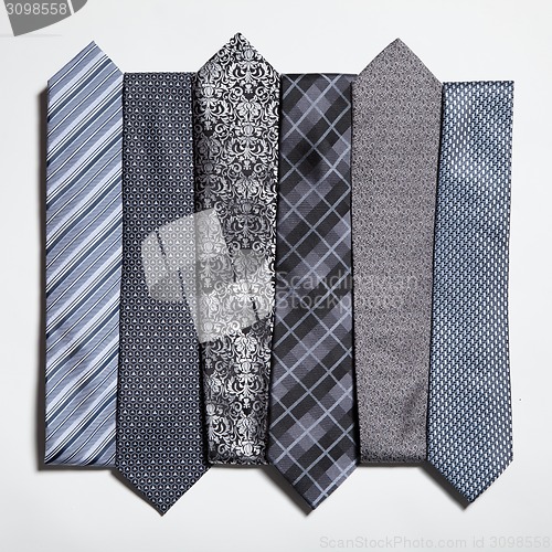 Image of different set of luxury tie on white 