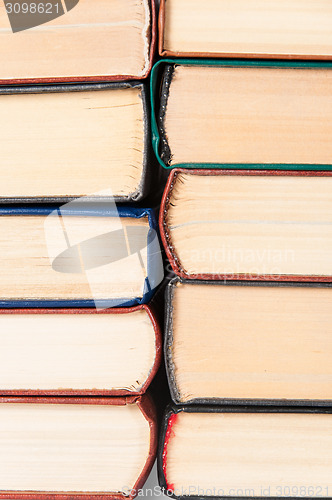 Image of Background is from old books stacked roots to each other
