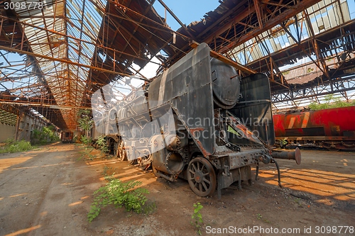 Image of Cargo trains in old train depot