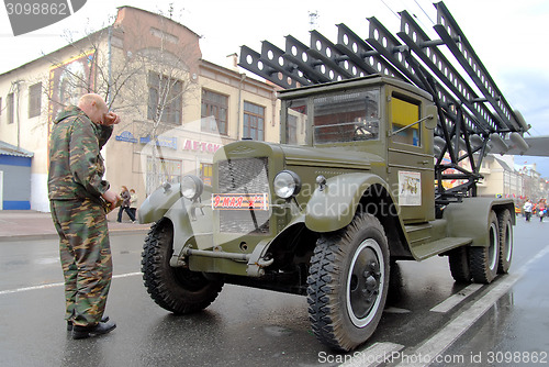 Image of Driver near Katyusha multiple rocket launchers