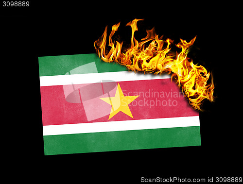 Image of Flag burning - Suriname