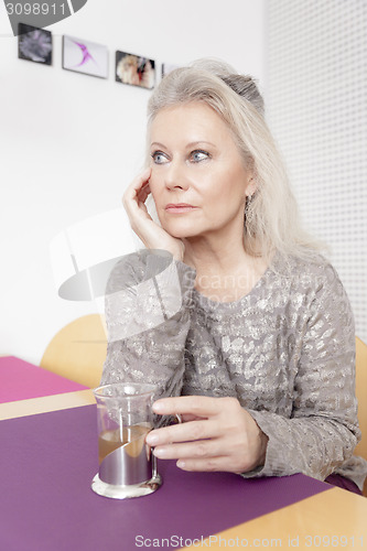 Image of woman and tea