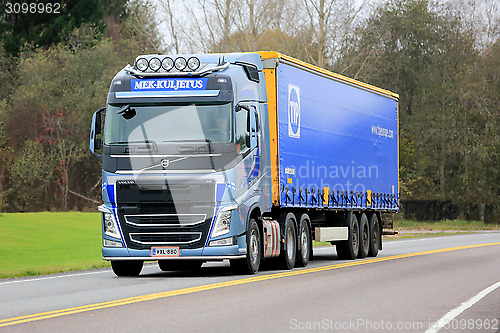Image of Blue Volvo FH Semi Truck on the Road